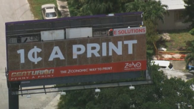 This billboard was put on Wednesday and is made up of 120,000 pennies.