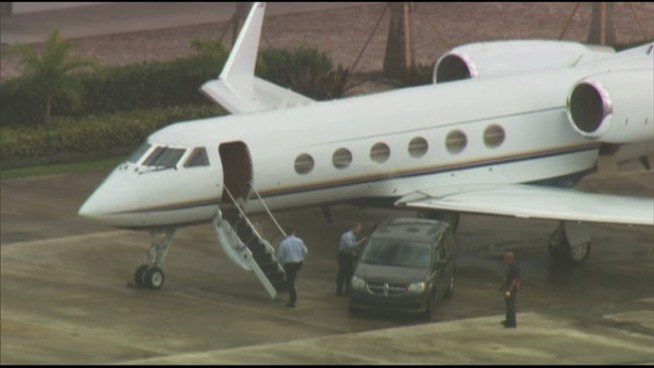 Peyton Manning landed at Opa-Locka Executive Airport Wednesday afternoon in the private plane of Indianapolis Colts owner Jim Irsay, on the same day that Manning and the only NFL team he has ever played for parted ways.