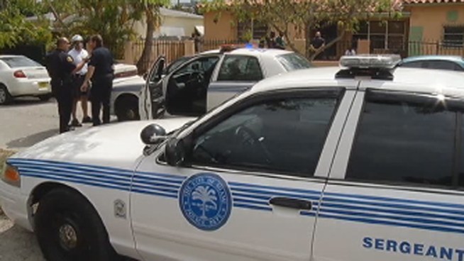 Police were in full force Tuesday at 210 NE 44th St. as a man, several women and children all were seen exiting the home carrying their belongings. Midtown Miami resident Carlos Carrillo and Miami Police Commander Manuel Morals spoke about the case.