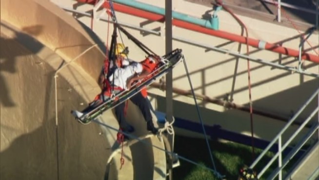 Watch aerial footage as authorities  rescue a worker who fell several feet into a water Lauderdale Lakes water tank early Friday morning.