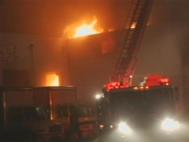Sixty firefighters worked on containing a blaze for over two hours that consumed the Barton G. warehouse, which held millions of dollars worth of supplies for his party planning business