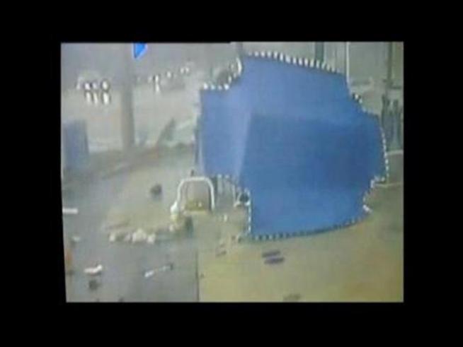 A Miami flower lady was swept away by a driving rain and a gust of wind.