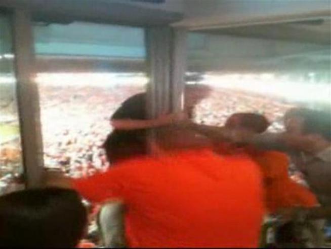 Dolphins' minority owner goes through a third level window to escape her locked luxury box at Sun Life Stadium.