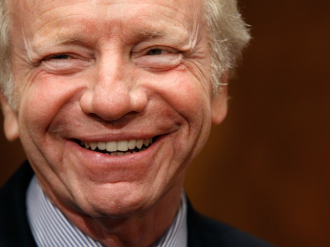 Lieberman is Man in Middle of Health Debate