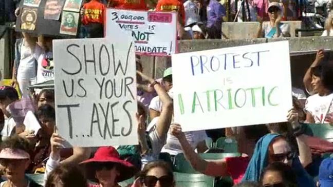 Demonstrators Hit Streets After Rally Reaches Capacity