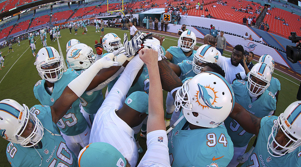 Dolphins Hold On to Spoil Chargers' LA Debut