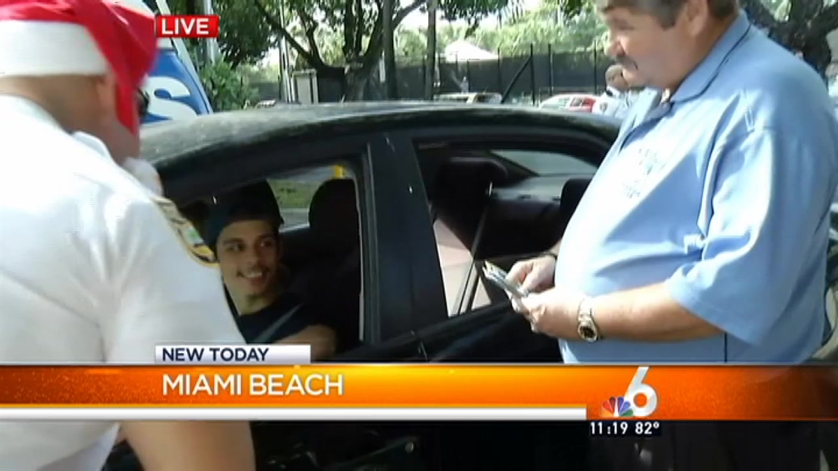 Miami Beach Officer Surprise Drivers with Gift Cards
