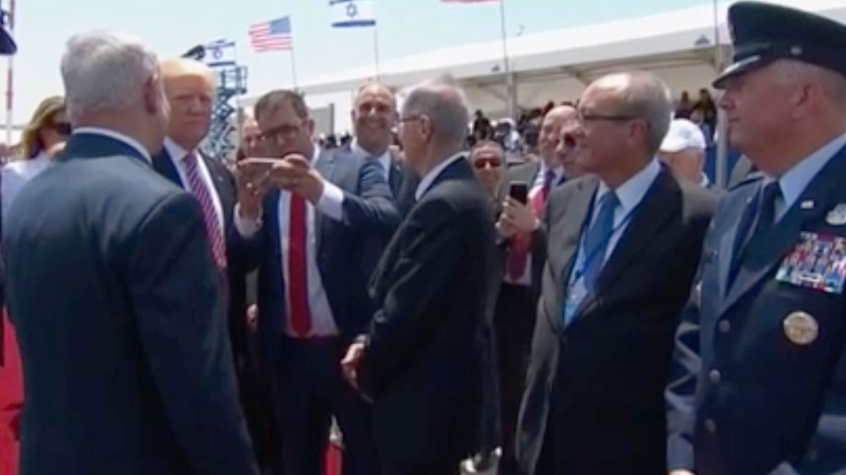Unwelcome Selfie, Melania Hand Slap: Trump Arrives in Israel