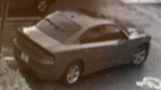 Surveillance image of a car connected with the robbery of a U.S. Postal Service letter carrier in Plantation.