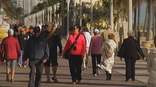 011714 cold weather south florida bundled up hollywood beach