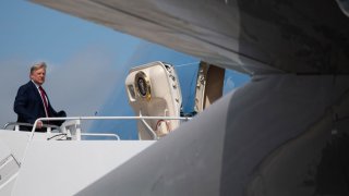 US President Donald Trump boards Air Force One at Palm Beach International Airport in West Palm Beach, Florida, February 16, 2020, as he travels to attend the Daytona 500 Nascar race. (Photo by SAUL LOEB / AFP) (Photo by SAUL LOEB/AFP via Getty Images)