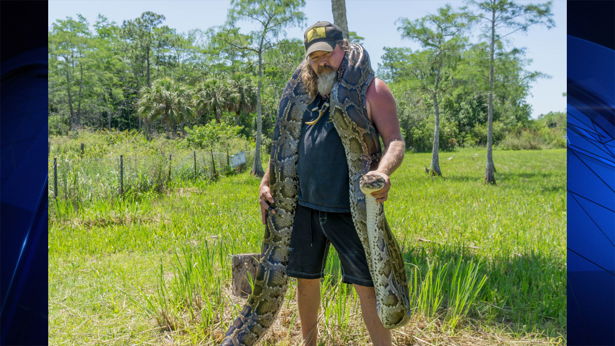 Barefoot Python Hunter Dusty “The Wildman” Crum Wrestles Huge Snake