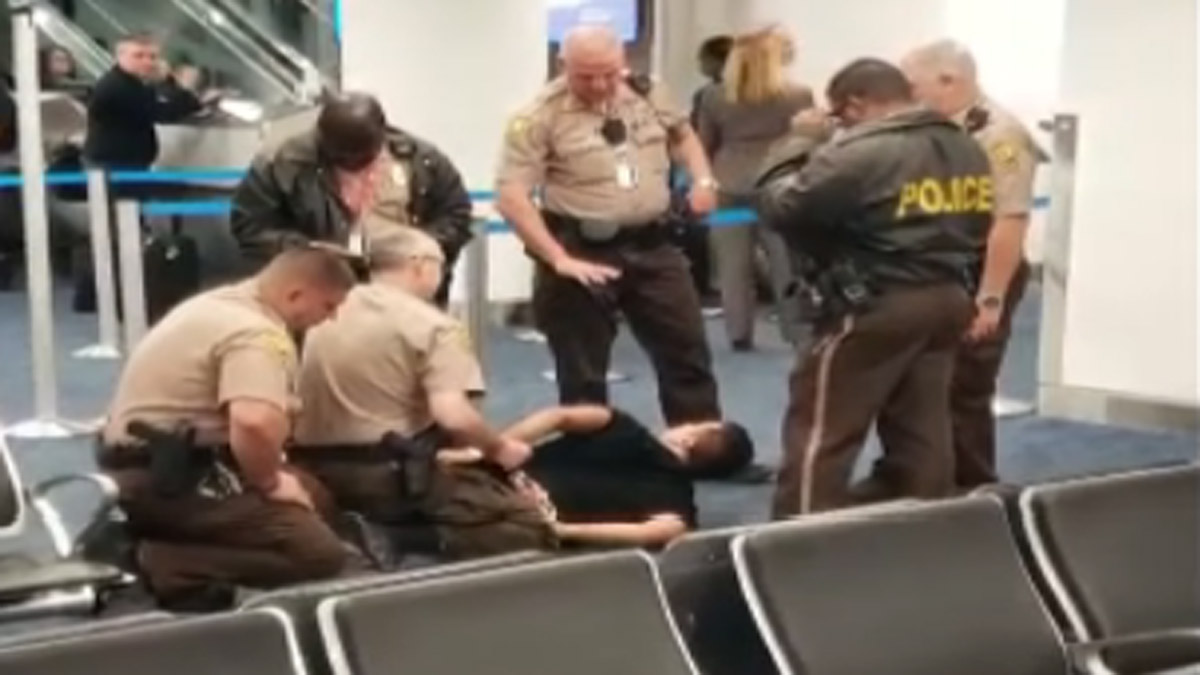 Naked man caught on video at Miami International Airport
