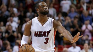 Heat waive Bosh, plan to retire his jersey number