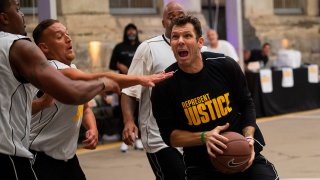 Sacramento Kings coach Luke Walton plays basketball with a team of inmates at Folsom State Prison in Folsom, California, on Dec. 12, 2019.