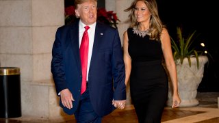 President Donald Trump and first lady Melania Trump arrive for Christmas Eve dinner at Mar-a-lago in Palm Beach, Fla., Tuesday, Dec. 24, 2019.