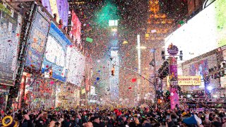 In this Jan. 1, 2020, file photo, confetti falls at midnight on the Times Square New Year's Eve celebration in New York.