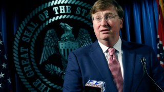 Republican Gov. Tate Reeves speaks with reporters about the state prison system, Thursday, Feb. 6, 2020, in Jackson, Miss. Reeves also gave an update on the search for a Mississippi Department of Corrections commissioner.
