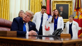 President Donald Trump listens during an event to sign a proclamation in honor of World Nurses Day