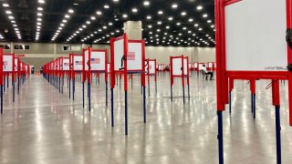 Voting stations are set up for the primary election at the Kentucky Exposition Center, Monday, June 22, 2020, in Louisville, Ky. With one polling place designated for Louisville on Tuesday, voters who didn’t cast mail-in ballots could potentially face long lines in Kentucky’s unprecedented primary election.