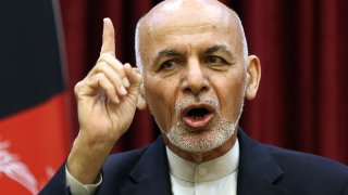 In this March, 1, 2020, file photo, Afghan President Ashraf Ghani speaks during a news conference in presidential palace in Kabul, Afghanistan. Squabbling Afghan presidential rivals threatened to declare themselves president in dueling ceremonies Monday, March 9, 2020, throwing plans for intra-Afghan negotiations into chaos.