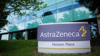 This May 18, 2020, photo shows a logo in front of AstraZeneca's building in Luton, Britain.