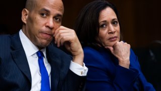Sen. Cory Booker, D- N.J., and listen Sen. Kamala Harris, D-Calif., during a Senate Judiciary Committee hearing on police use of force and community relations on on Capitol Hill, Tuesday, June 16, 2020 in Washington.