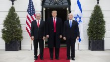 Benjamin Netanyahu, Israel's prime minister, from left, U.S. President Donald Trump, and U.S. Vice President Mike Pence, stand for a photograph on the South Portico of the White House in Washington, D.C., U.S., on Monday, March 25, 2019.