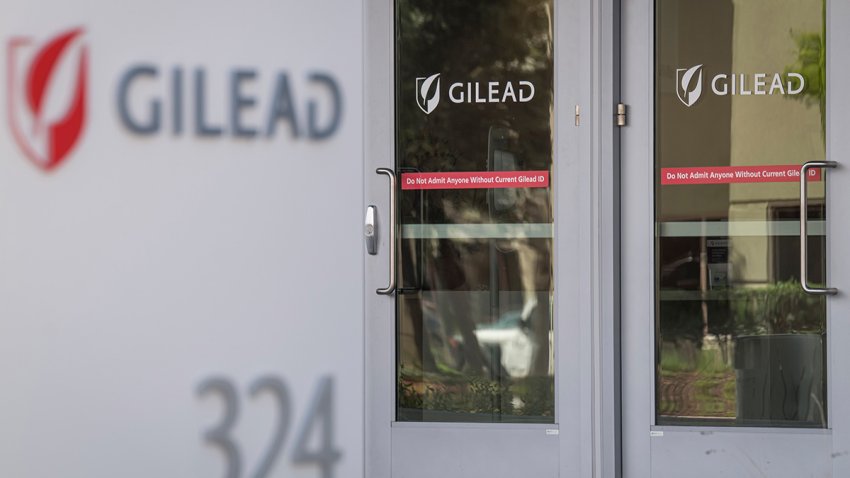 Signs display the company logo at the headquarters of Gilead Sciences Inc., in Foster City, California, March 19, 2020.
