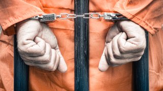 File Image: Generic man in handcuffs