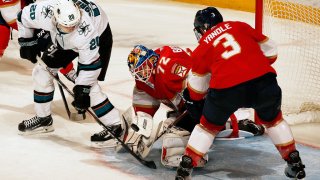SUNRISE, FL – DECEMBER 8: Goaltender Sergei Bobrovsky #72 of the Florida Panthers defends the net with the help of teammate Keith Yandle #3 against Markus Sorensen #20 of the San Jose Sharks at the BB&T Center on December 8, 2019 in Sunrise, Florida. (Photo by Eliot J. Schechter/NHLI via Getty Images)