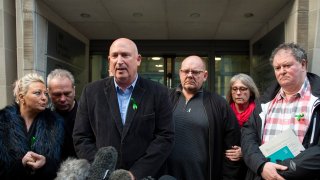 This Dec. 20, 2019, photo shows the family of Harry Dunn — from left to right: mother Charlotte Charles, stepfather Bruce Charles, family spokesman Radd Seiger, father Tim Dunn, stepmother Tracey Dunn and solicitor Mark Stephens — outside the Ministry of Justice in London after meeting with the director of Public Prosecutions.