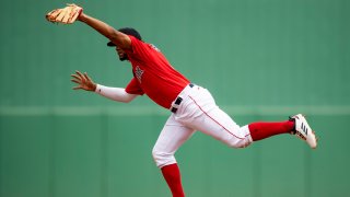 Xander Bogaerts of the Boston Red Sox catches a line drive during the first inning of a Grapefruit League game against the St. Louis Cardinals on March 10, 2020 at jetBlue Park at Fenway South in Fort Myers, Florida.