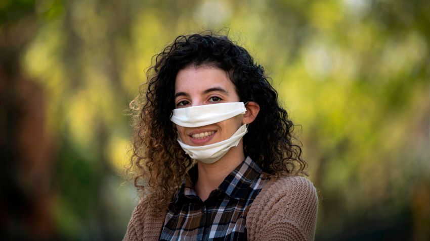 French leather creator Anissa Mekrabech, 30 year-old, wearing the protective face mask she created for the deaf and the hearing-impaired