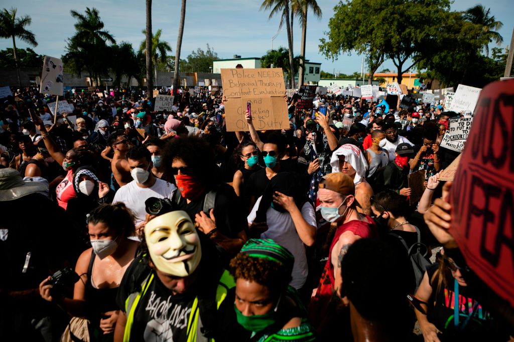 Protestors gather at Fort Lauderdale Police Department during a rally in response to the recent death of George Floyd in Fort Lauderdale, Florida on May 31, 2020.