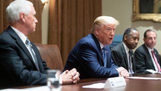 President Donald Trump speaks during a roundtable meeting on seniors alongside Vice President Mike Pence (L), Secretary of Housing and Urban Development Ben Carson (2nd R) and Secretary of Health and Human Services Alex Azar (R), in the Cabinet Room at the White House in Washington, DC, June 15, 2020. - President Donald Trump holds a roundtable discussion with senior citizens called Fighting for Americas Seniors on Monday.