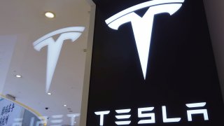A Tesla logo is seen at a store on April 21, 2020, in Hangzhou, Zhejiang Province of China.
