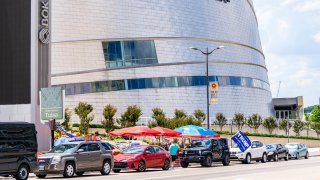 Vehicles sit parked outside of the BOK Center ahead of a rally for U.S. President Donald Trump in Tulsa, Oklahoma, U.S., on Wednesday, June 17, 2020.
