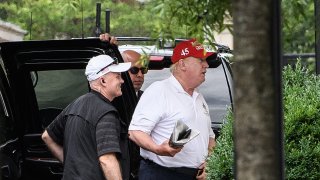 US President Donald Trump steps out of his vehicle upon his return to the White House in Washington, DC, on June 28, 2020 after golfing at his Trump National Golf Club in Virginia.