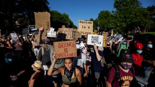 A protest following the fatal arrest of George Floyd is held at Minnesota Gov. Tim Walz's official residence on June 1, 2020, in St. Paul, Minnesota.