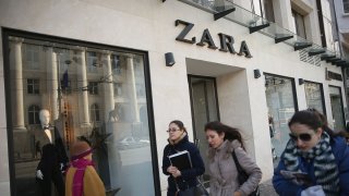 In this Dec. 7, 2013, file photo, young women walk past a Zara clothing store in Sofia, Bulgaria.