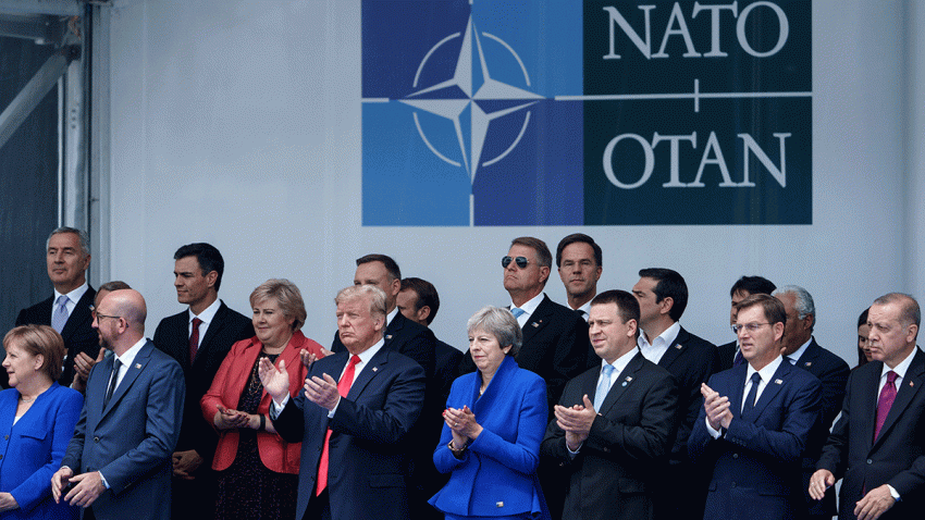 In this July 11, 2018, file photo, NATO leaders, including President Donald Trump, applaud after posing for a family photo during the NATO (North Atlantic Treaty Organization) summit at the NATO headquarters in Brussels.