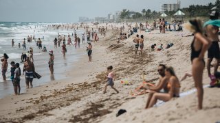 People gather on the beach Delray Beach, Florida, U.S., on Saturday May 23, 2020.
