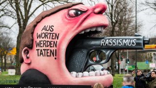 A float with an effigy depicting the current racist situation in Germany is seen ahead of the Rose Monday carnival parade on February 24, 2020 in Dusseldorf, Germany.