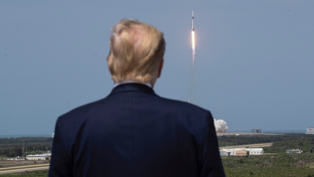 President Donald Trump views the SpaceX flight to the International Space Station, at Kennedy Space Center, Saturday, May 30, 2020, in Cape Canaveral, Fla.