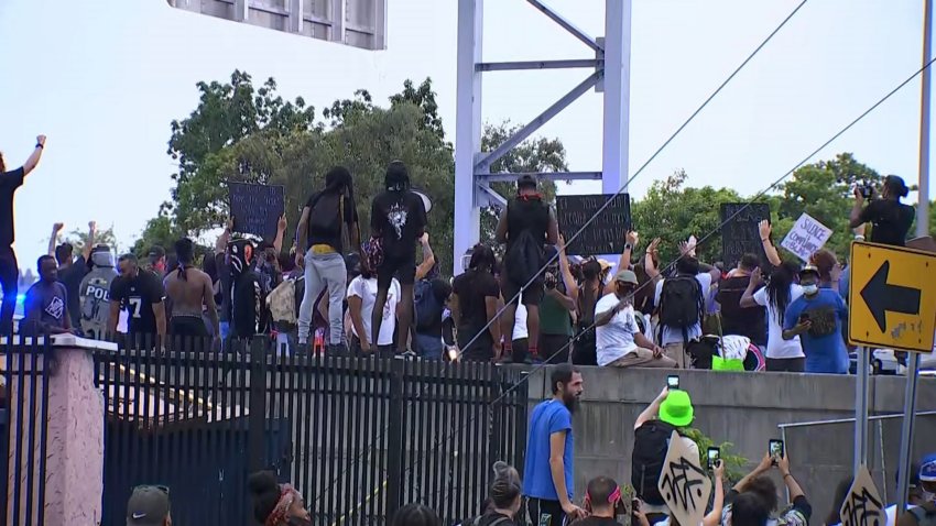 Protesters Climb Onto I-95 Amid Protests in Downtown Miami