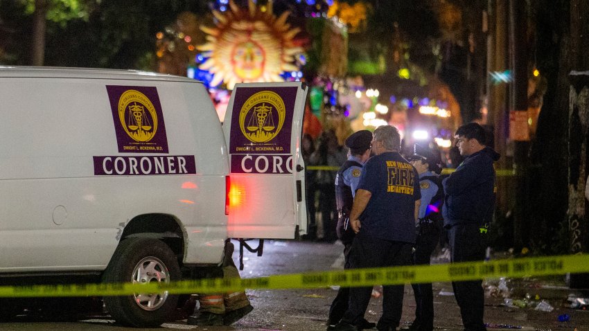Emergency personnel work the scene after a person was run over and killed by a float in the Mystic Krewe of Nyx parade during Mardi Gras celebrations in New Orleans, Wednesday, Feb. 19, 2020.