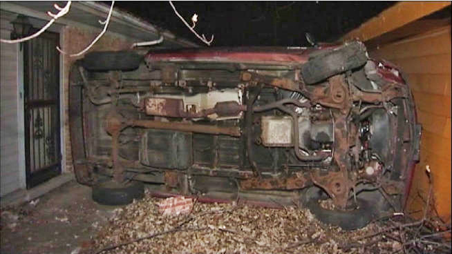 car-flipped-wedged