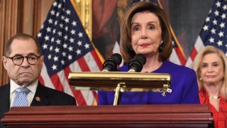 Speaker of the House Nancy Pelosi (C), flanked by House Judiciary Chairman Jerry Nadler, (L) (D-NY) and House Committee on Oversight and Reform Chairwoman Carolyn Maloney (R) (D-NY), announces articles of impeachment against US President Donald Trump during a press conference at the US Capitol in Washington, DC, December 10, 2019. – Democrats listed abuse of power and obstruction of Congress. (Photo by SAUL LOEB / AFP) (Photo by SAUL LOEB/AFP via Getty Images)