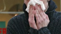 CDC director says U.S. isn't yet near peak Covid or flu levels for the season
